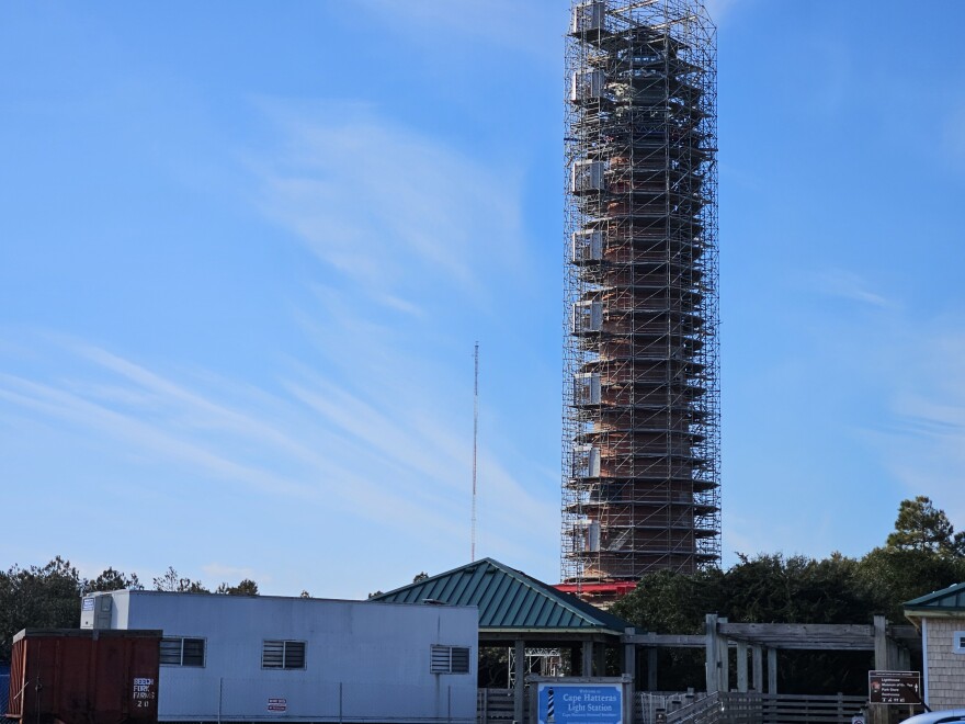 The Cape Hatteras Lighthouse is surrounded by scaffolding for a restoration project, but the visitor center and the Museum of the Sea remain open.