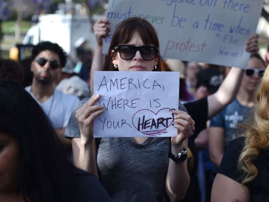 Critics of U.S. government policy that separates children from their parents when they cross the border illegally from Mexico protest in downtown LA on June 14.