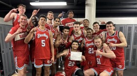 The Bradley men's basketball team celebrates fifth-year senior Ja'Shon Henry (22) reaching 1,000 career points in the Braves' 76-66 road win over Valparaiso on Wednesday night.