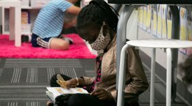  A student reads at Crestview Elementary in the Shawnee Mission School District.