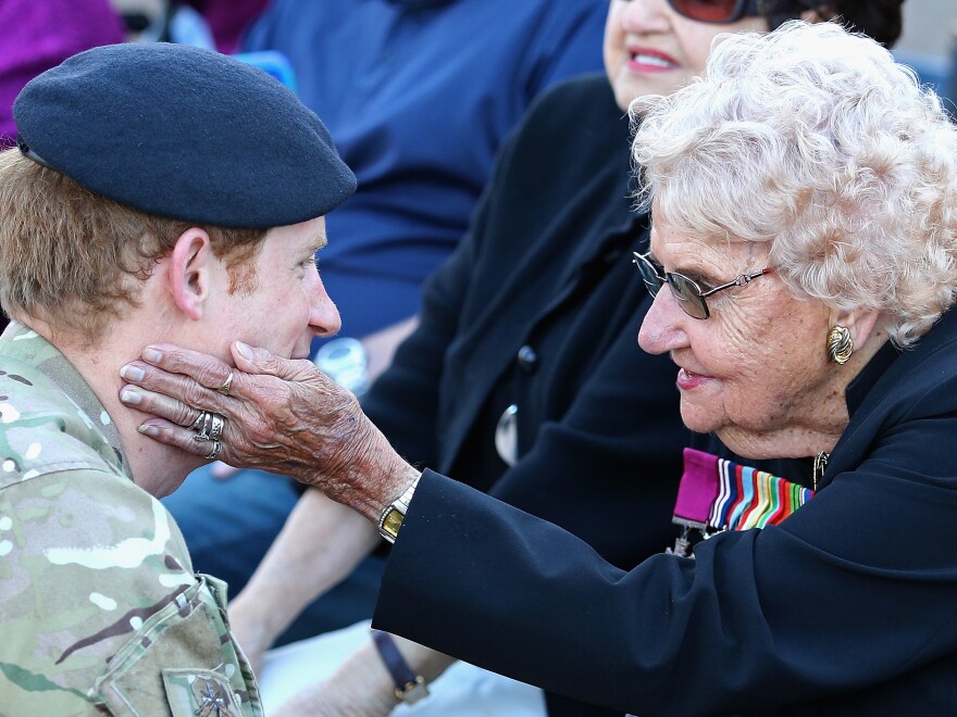 Prince Harry meets Daphne Dunne outside the Sydney Opera House in 2015.