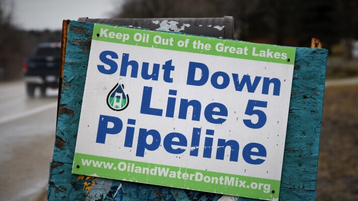 One of the many signs opposing Line 5 seen along roads in Leelanau County, Michigan.