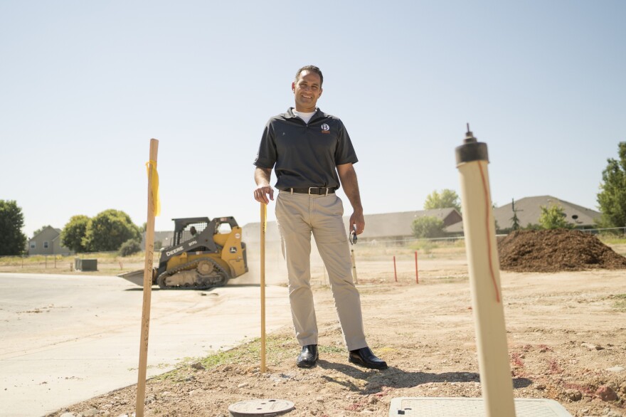 Joe Atalla, an architect by trade who now owns his own building firm, stands at the site of Settlers Lane in Meridian. The site will be home to 19 homes at completion.