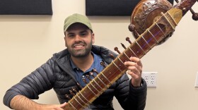 Musician Keshav Batish with his sitar in the KAZU studio