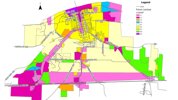 Boonville's long-term zoning and annexation goals, mapped with no intent to force annexation but to show logical development moving forward. The map adds commercial districts along I-70, and residential districts fill the gap where land is currently not incorporated in Boonville.