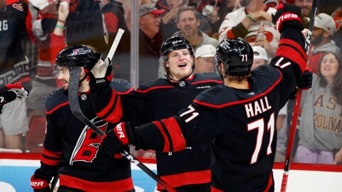 Carolina Hurricanes' Jackson Blake (53) celebrates his goal with teammate Taylor Hall (71) during the second period in Game 5 of the Eastern Conference finals NHL hockey Stanley Cup playoff series against the Montreal Canadiens in Raleigh, N.C., Friday, May 29, 2026.