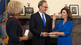 Kathy Hochul at her initial swearing-in ceremony, just after midnight, early Tuesday morning, as she becomes New York's 57th Governor.
