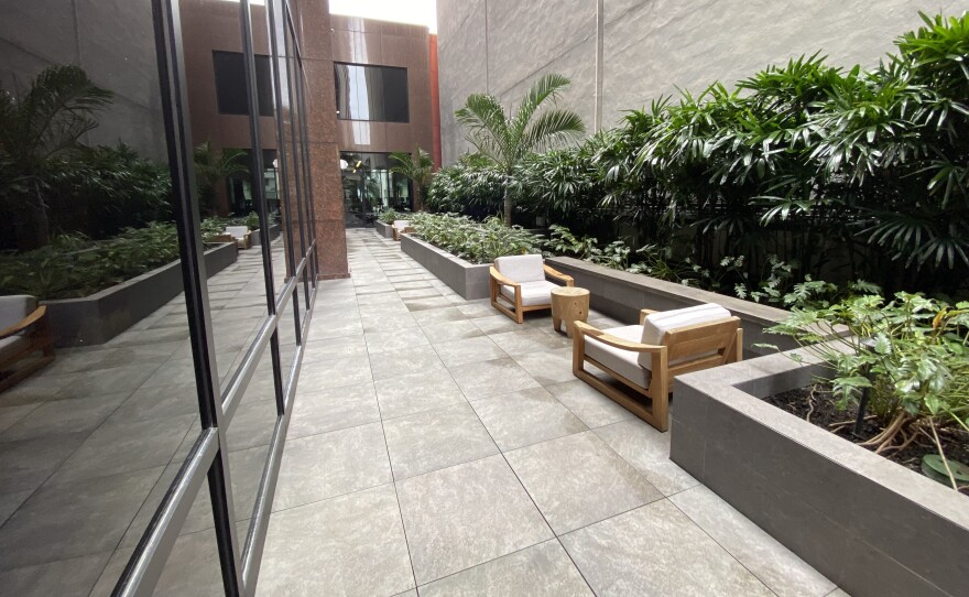 A seating area outside at The Residences at Bishop Place.