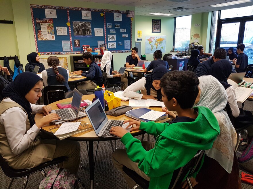 Eighth-graders write letters to local representatives about issues that concern them.