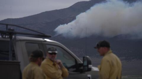 Firefighters gather near the Cottonwood Fire near Junction, Utah, on Friday, June 26, 2026. (Ty ONeil/AP)