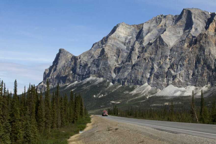 A truck makes its way south on the Dalton Highway near Coldfoot, Alaska.