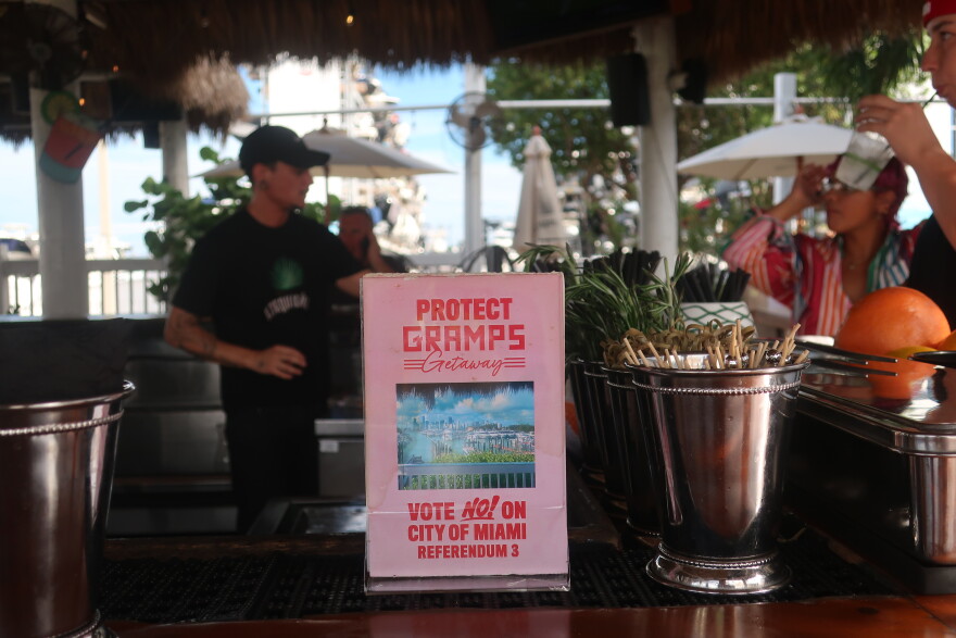 A sign on a bar reads: Protect Gramps Getaway. Vote no! On city of Miami referendum 3."