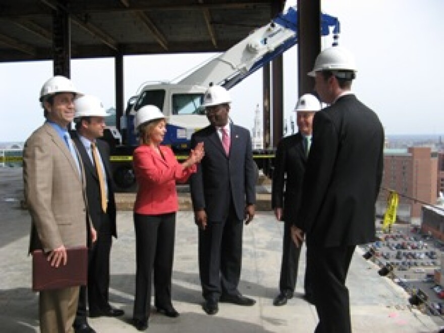 Mayor Brown and Uniland Development Company representatives discuss plans for 200 Delaware Avenue, the former Dulski Federal Building, on the 15th floor of the building.
