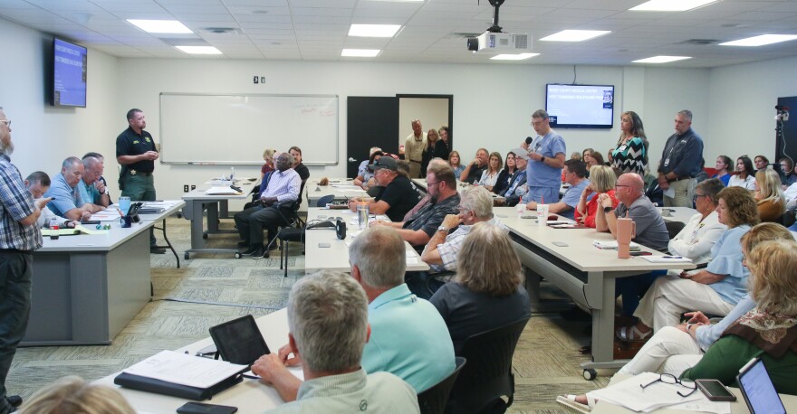 Lyle Parsons speaks to Henry County commissioners and the Henry County Medical Center Board of Trustees at a meeting on May 30.