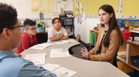 Wilkes-Barre senior Tess Welles works with students at Daniel J. Flood Elementary School as part of the Education Experience program.