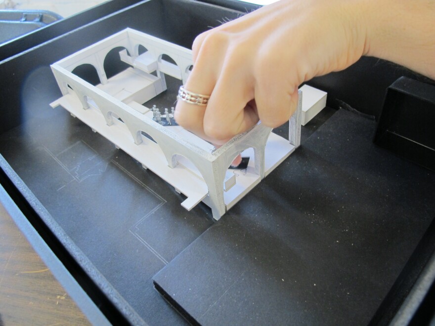 Director Alex Timbers shows off a miniature model set for <em>Here Lies Love.</em>