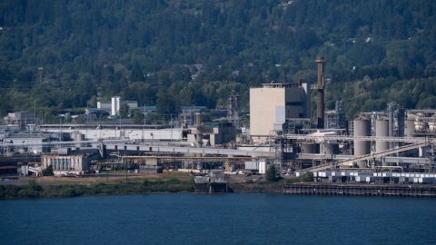 Nippon Dynawave Packaging Co. sits on the Columbia River, in Longview, Wash., on May 27, 2026. Contamination entered the river following the plant’s chemical disaster, but state officials quickly worked to control further contamination.
