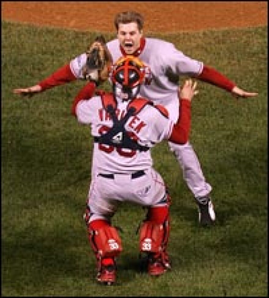 Pitcher Jonathan Papelbon celebrates with catcher Jason Varitek after the Red Sox won the 2007 World Series in a four-game sweep.