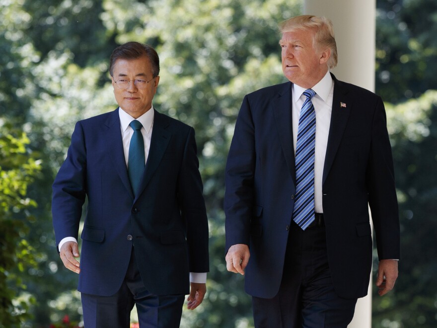 South Korean President Moon Jae-in walks with President Trump to make statements in the Rose Garden of the White House in June.