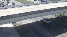 One lane of I-75 at Proctor Road in Sarasota County remained closed after a truck hit a road sign and a bridge earlier Monday.