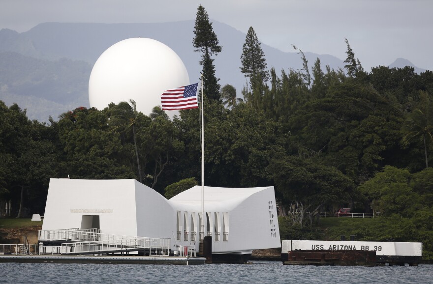 FILE - USS Arizona Memorial, part of the World War II Valor in the Pacific National Monument, is seen at Joint Base Pearl Harbor-Hickam, Hawaii on Dec. 27, 2016. (AP Photo/Carolyn Kaster, File)