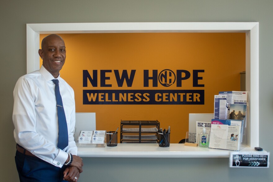 Theodore Noel, President and CEO of Guiding Right, stands in front of the check-in counter at the nonprofit's clinic and wellness center in Northwest Oklahoma City.
