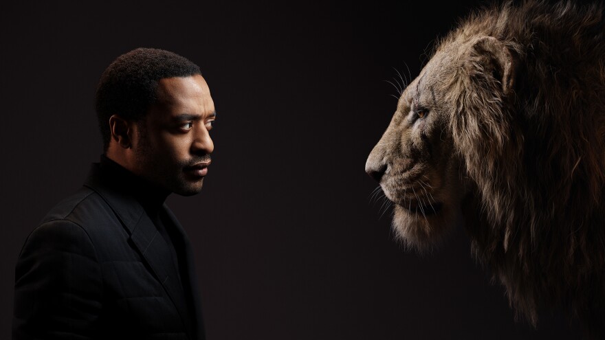 Chiwetel Ejiofor and his onscreen counterpart in 2019's <em>The Lion King</em>, the power-hungry villain Scar.