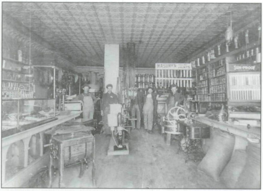 Census data suggest that most of the men depicted in this photograph taken inside Helgerson's Hardware in Presho had moved elsewhere by 1920.