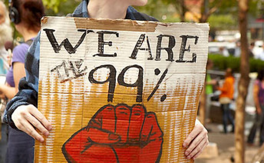 Occupy Wall Street protester (schiffc, Flickr Creative Commons)