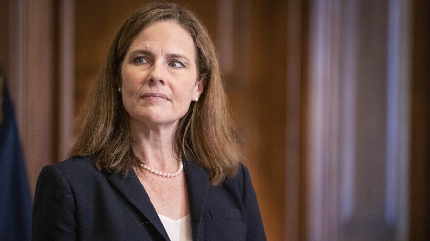 In a near-party-line vote Sunday, Senate Republicans advanced President Trump's Supreme Court nominee, Judge Amy Coney Barrett, seen here on Capitol Hill on Wednesday. A final confirmation vote is set for Monday evening.