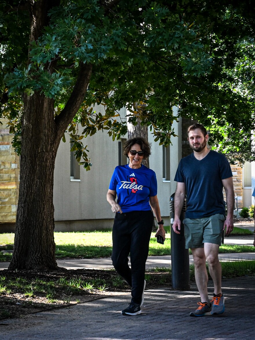 University of Tulsa President Stacy Leeds (left) walks beside Assistant Clinical Professor of Law Alexander Gavern, J.D. during the first routine Wednesday Walk and Leeds first day at the helm.
