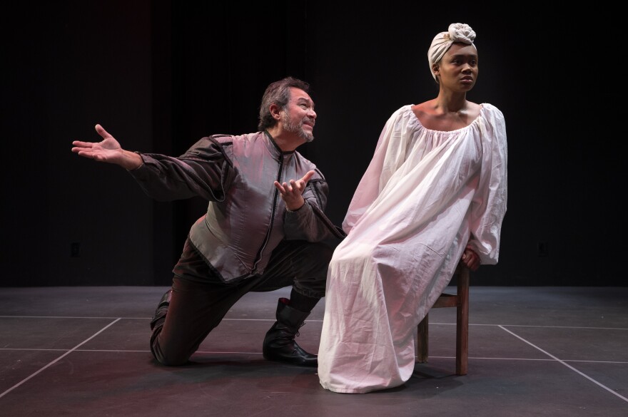 Don Pedro (Rodney Garza) tries to woo Santiaga (Sydney Hewitt), an enslaved woman he owns, in the English-language premiere of "Yanga."