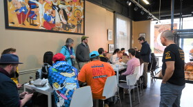 A community meeting, organized by Charlotte Urbanists, gathers at Manolo's Bakery to discuss how policy affects immigrant-owned businesses.
