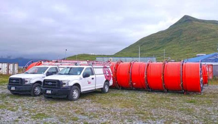 Spools of fiber conduit, plus work vehicles for the installation crews, recently&#13;
arrived in Unalaska.