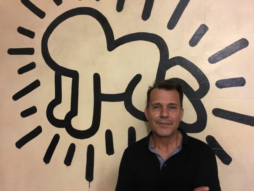 Familiar Haring figures, such as the radiant baby, appear on the walls at Grace House. Building resident Robert Savina has been fighting eviction and trying to protect the mural.