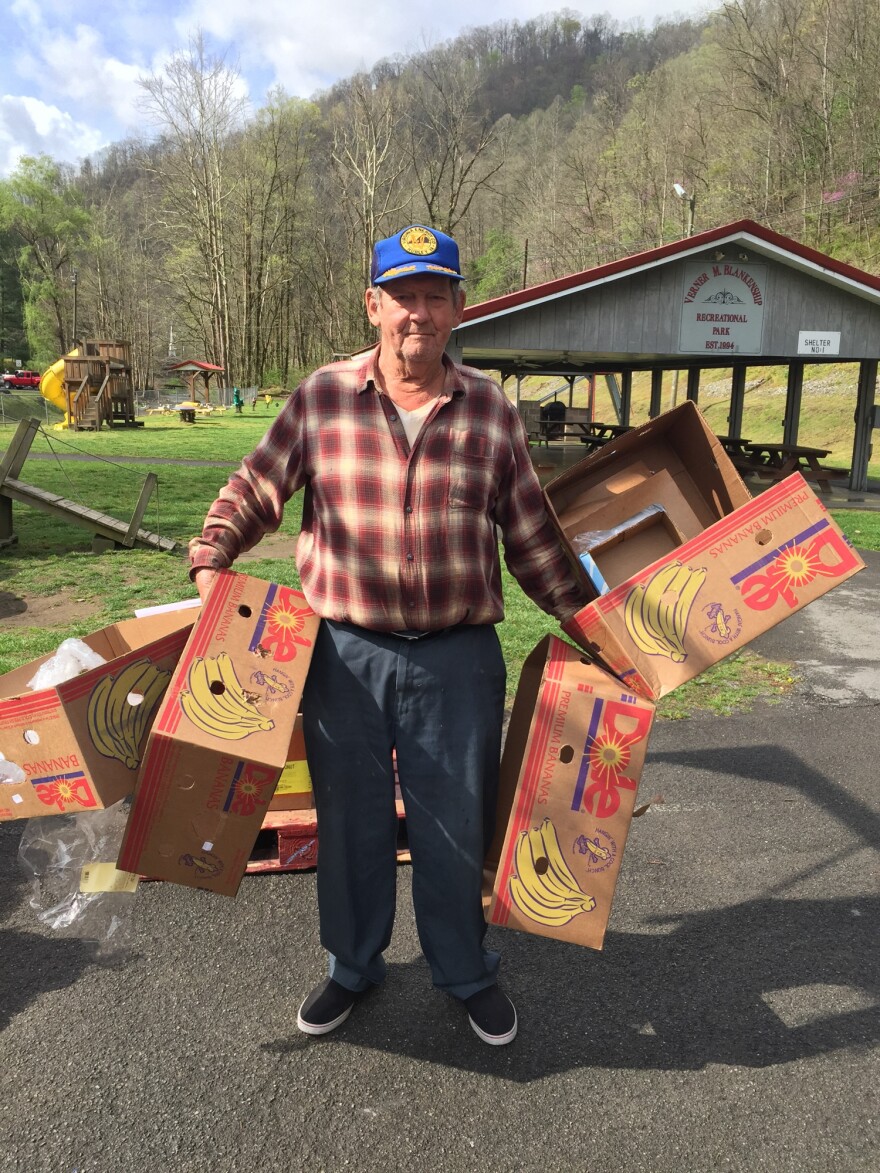 Abraham Lincoln Lester, 83, worked in the coal mines in southwest Virginia for 39 years before retiring. He says such jobs are now scarce, and hunger has become a big problem in the area. Lester goes to the mobile food pantry in Hurley for food and empty boxes, which he uses later.