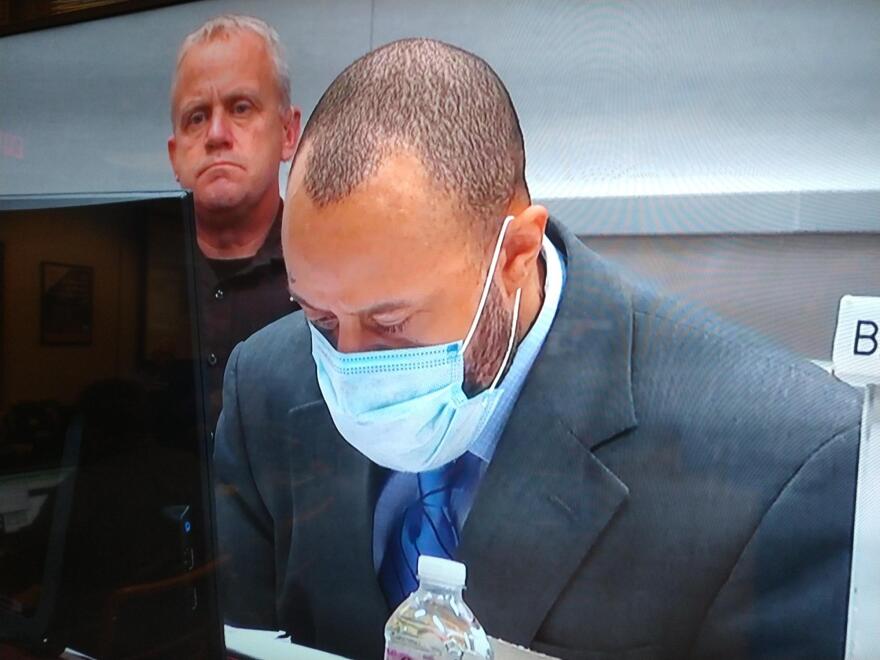 Defendant Darrell Brooks pauses Thursday to collect his emotions, after cross-examining a prosecution witness in the Waukesha parade deaths trial.