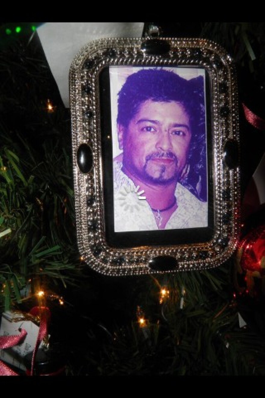 One of the pictures hung on last year's tree. David Lujan, 45, murdered August 2008