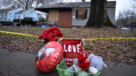 A memorial formed outside the home of a Guatemalen family on Academy Street Thursday Jan. 3. Two children died from their injuries from a fire at the home.