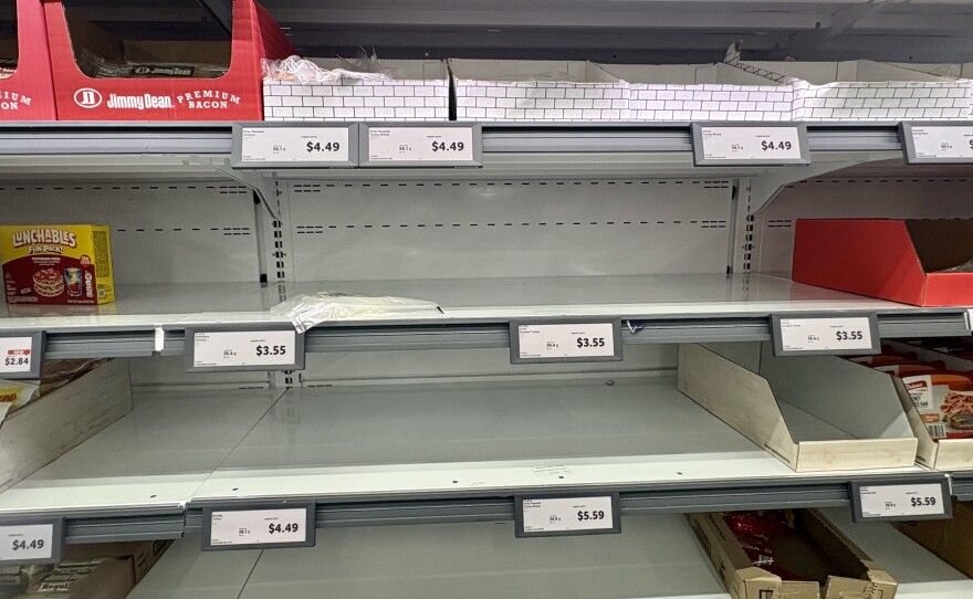 Empty shelves at a grocery store in Maryland as people prepare for a massive winter storm this weekend.