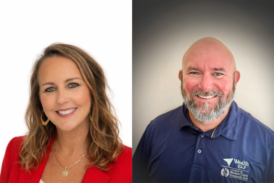 A woman in a red blazer and man in a blue polo pose for professional photos