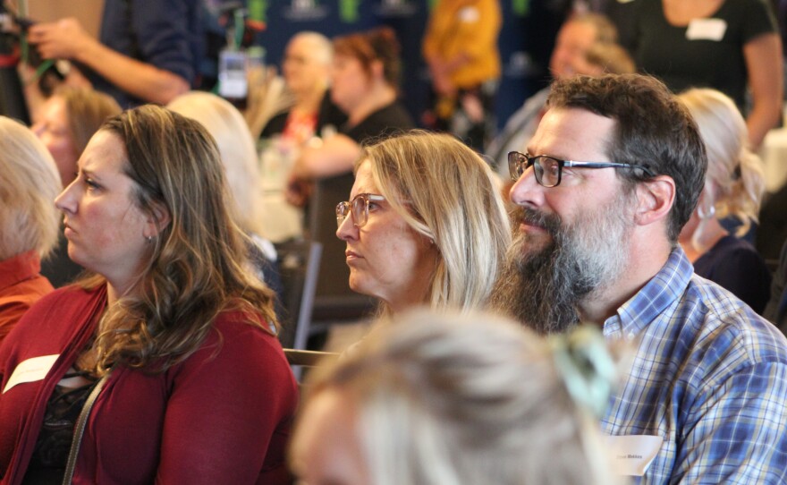 Attendees listen to the 2025 State of the Range at the Iron Trail Motors Event Center in Virginia on Sept. 17, 2025.