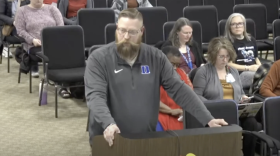 Ronald Jason Lucero speaks at a school board meeting in 2025.
