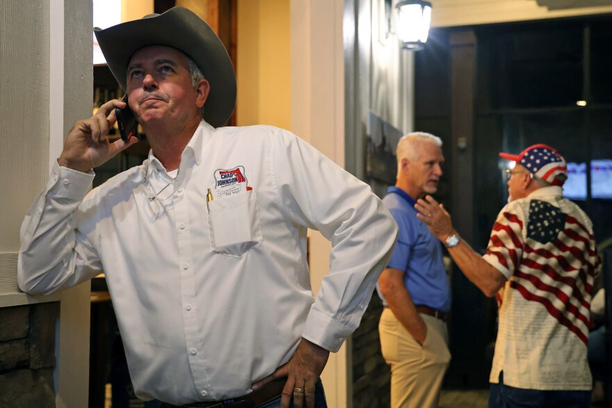 Chad Johnson takes a call from House Speaker Daniel Perez, while awaiting the results of the election at Stonehouse Grill in Newberry, Fla., Tuesday, Nov. 5th 2024. (Sydney Johnson/WUFT News)