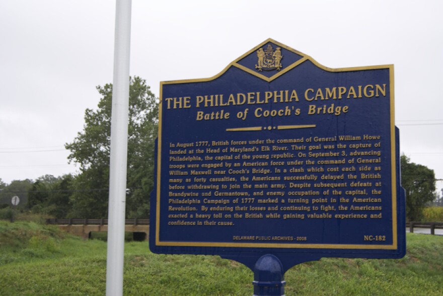 The historic marker at Cooch's Bridge tells the Revolutionary War battle's story