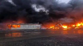 Both the warehouse and nearby stock room were involved in the fire, according to a press release from Peter Pan. The company said there were no injuries.