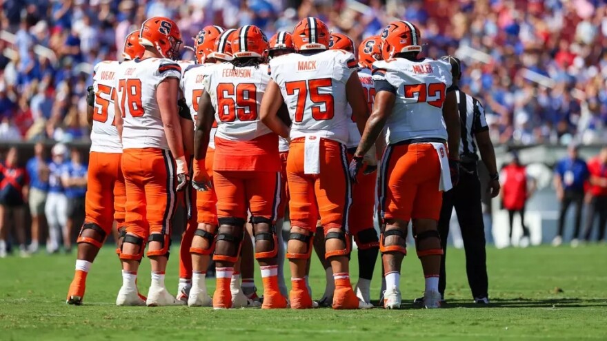 Syracuse in the huddle against SMU
