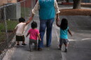 A teacher escorts young children back to their classroom at a Head Start preschool in Immokalee, Fla., Thursday, Sept. 10, 2026.