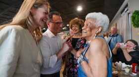 Paige Cognetti and Gov. Josh Shapiro speak with Beatriz Mallory and her 87-year-old mother, Evangelina, who has been a lifelong resident of Puerto Rico and plans to vote in Pennsylvania for the first time this fall.