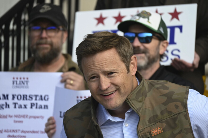 Republican Aaron Flint listens to a reporter during a press conference in Missoula on Oct. 1, 2026. Flint attacked his opponent for lobbying in support of a sales tax, and says he wants to keep the “crazy” out of Montana.